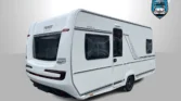 Karavan Fenot Apero 465, moderní design a pohodlný prostor pro cestování. Ideální pro dobrodružství na cestách.
